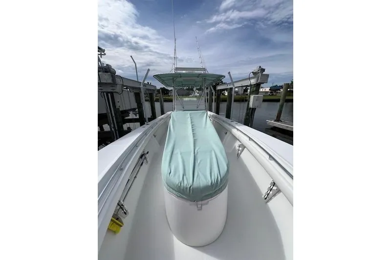 Slide: The Image of 2007 SeaCraft SC32 Master Angler boat with open storage compartment on deck. - 10
