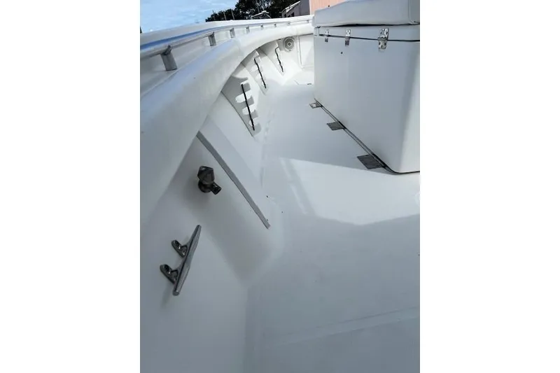 Slide: The Image of 2007 SeaCraft SC32 Master Angler boat deck with fishing rod holders and cleats. - 15