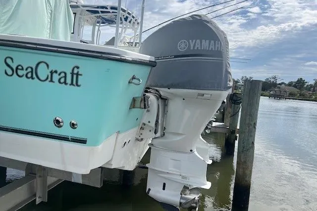 Slide: The Image of 2007 SeaCraft SC32 Master Angler dashboard with Garmin navigation displays and controls. - 20