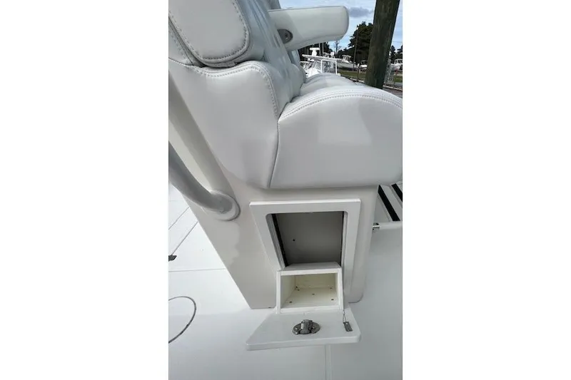 Slide: The Image of Beautiful COMFORTABLE Seats behind Helm with cup holders. - 37