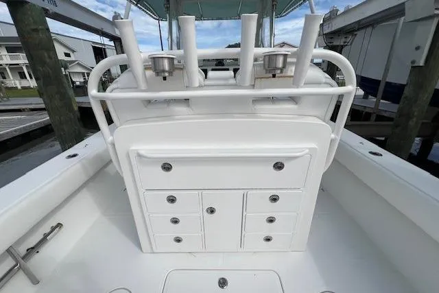 Slide: The Image of Seating area in center console that opens to have access to Batteries, Head, Electronics.. - 40