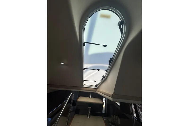 Slide: The Image of Interior view of 1998 Carver 530 Voyager Pilothouse with skylight and stairs. - 38