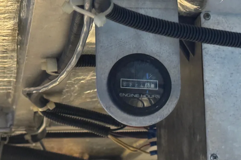 Slide: The Image of Engine hour meter showing 1224.61 hours on 1998 Carver 530 Voyager Pilothouse. - 103