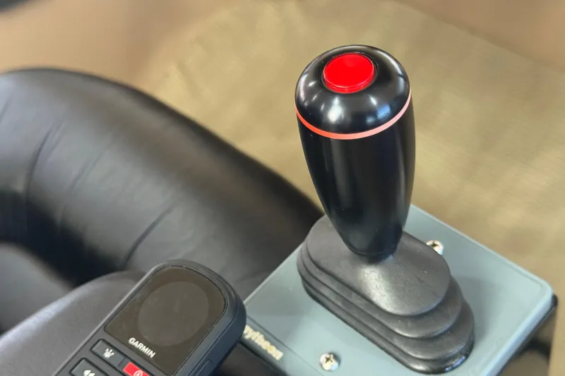 Slide: The Image of Joystick control in 1998 Carver 530 Voyager Pilothouse, featuring Garmin device. - 36