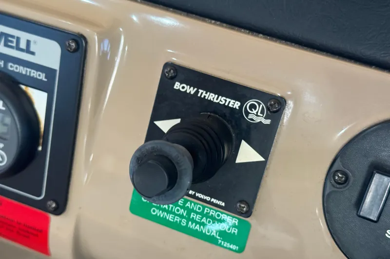Slide: The Image of Control panel of 1998 Carver 530 Voyager Pilothouse with bow thruster switch. - 37
