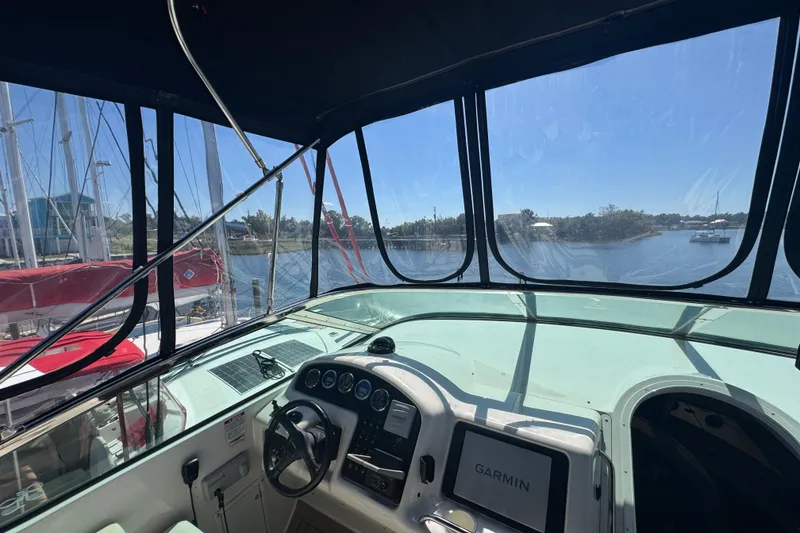 Slide: The Image of Interior view of 1998 Carver 530 Voyager Pilothouse with Garmin navigation system. - 51