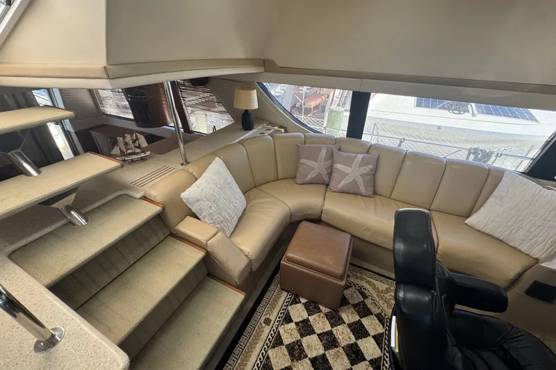 Slide: The Image of Luxurious interior of 1998 Carver 530 Voyager Pilothouse with plush seating and elegant decor. - 53