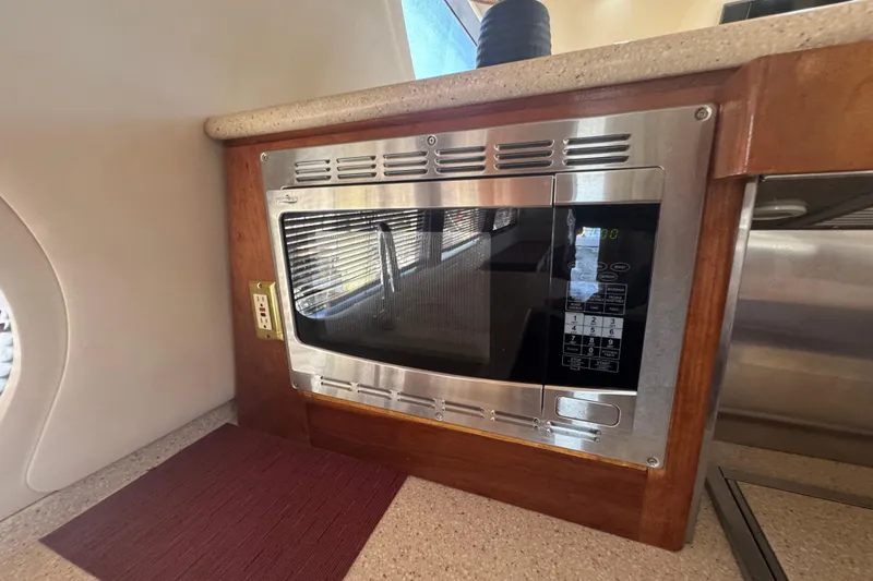 Slide: The Image of Built-in microwave in 1998 Carver 530 Voyager Pilothouse kitchen area. - 62