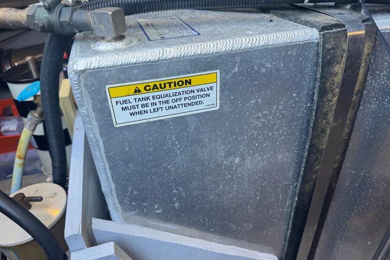 Slide: The Image of Fuel tank with caution label on 1998 Carver 530 Voyager Pilothouse. - 83