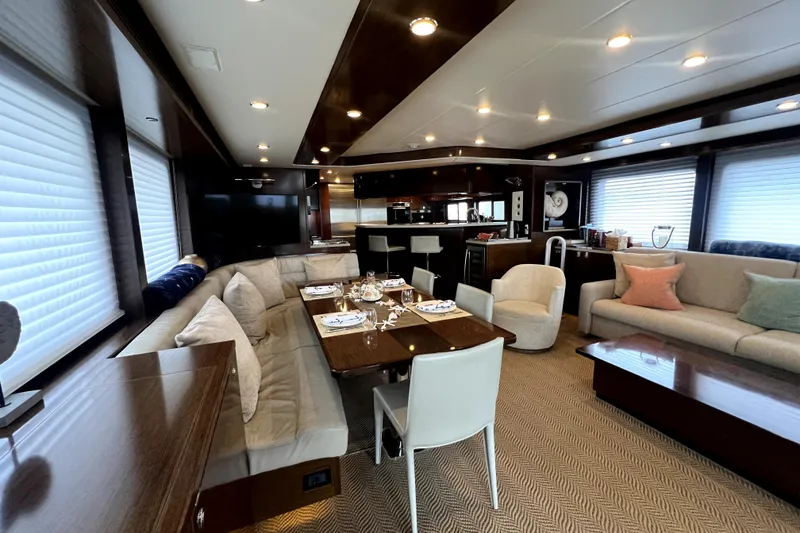 Slide: The Image of Luxurious interior of 2009 Nordhavn N78 yacht with elegant dining and seating area. - 16