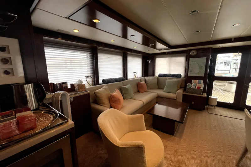 Slide: The Image of Luxurious interior of 2009 Nordhavn N78 yacht with cozy seating and elegant decor. - 17