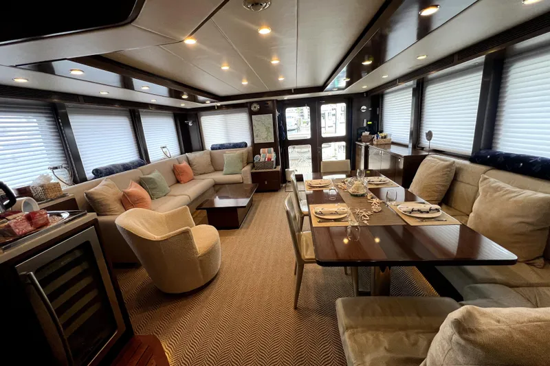 Slide: The Image of Luxurious interior of 2009 Nordhavn N78 yacht with elegant seating and dining area. - 18