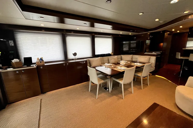 Slide: The Image of Luxurious interior of 2009 Nordhavn N78 yacht with elegant dining area and modern furnishings. - 19