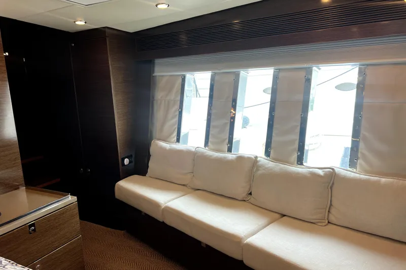 Slide: The Image of Luxurious interior of 2009 Nordhavn N78 yacht with plush seating and large windows. - 32