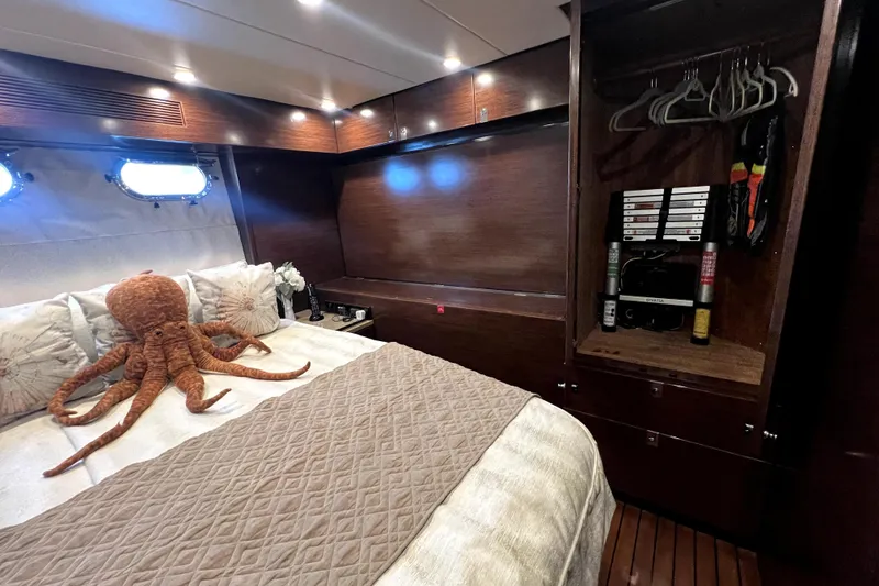 Slide: The Image of Luxurious Nordhavn N78 bedroom with plush octopus decor and elegant wood finishes, 2009 model. - 36