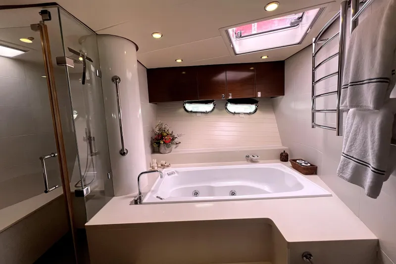 Slide: The Image of Luxurious bathroom on 2009 Nordhavn N78 yacht with jacuzzi and modern fixtures. - 37