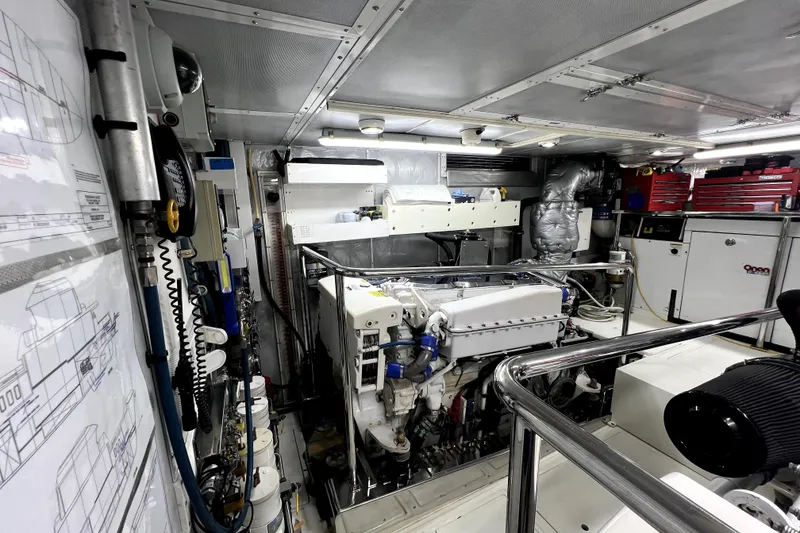 Slide: The Image of Engine room of 2009 Nordhavn N78 yacht, featuring machinery and equipment. - 42