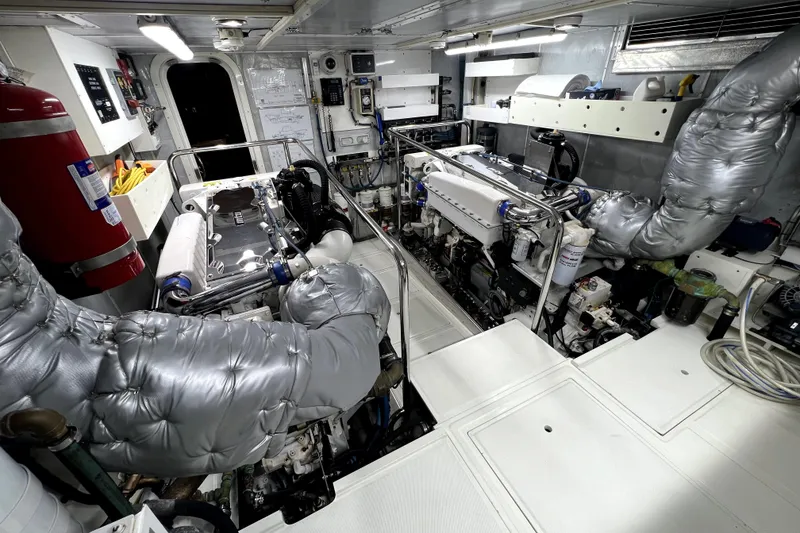 Slide: The Image of Engine room of 2009 Nordhavn N78 yacht, featuring advanced machinery and equipment. - 43