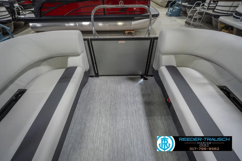 Slide: The Image of Interior of 2026 Bennington 20 SSR pontoon boat with gray seating and flooring. - 18