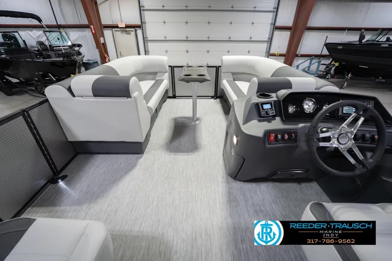 Slide: The Image of 2026 Bennington 20 SSR pontoon boat interior with modern seating and control panel. - 20