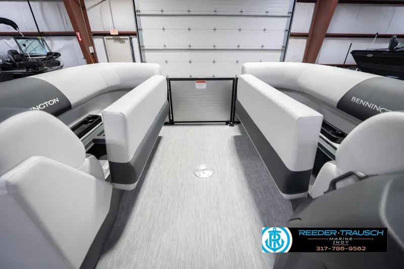 Slide: The Image of 2026 Bennington 20 SSR pontoon boat interior with gray seating and flooring. - 23