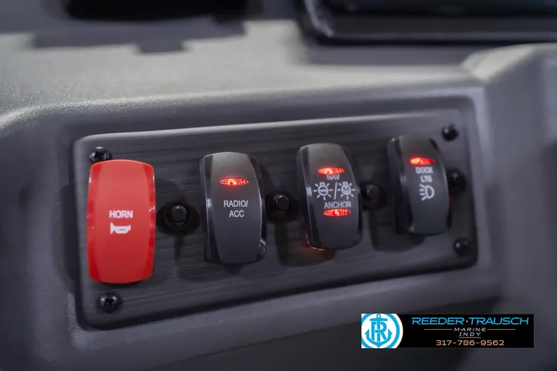 Slide: The Image of Control panel of 2026 Bennington 20 SSR boat with labeled switches. - 33