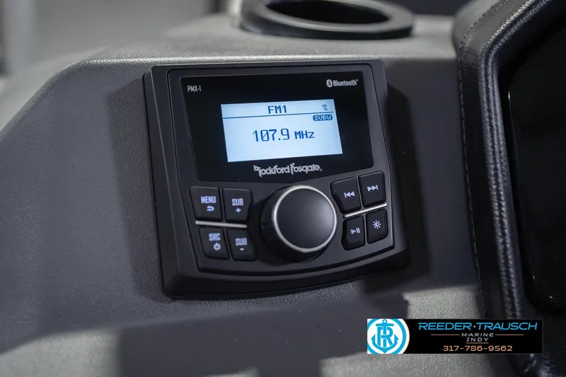 Slide: The Image of 2026 Bennington 20 SSR boat stereo system displaying FM 107.9 MHz. - 34