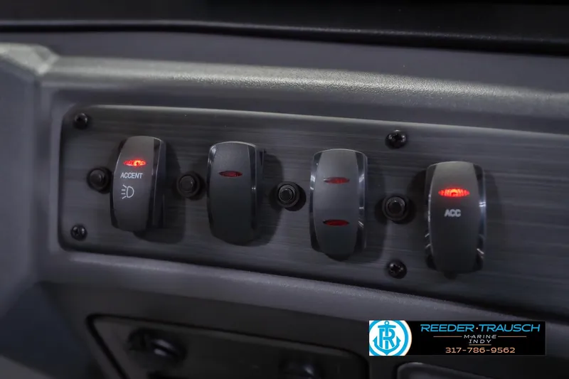 Slide: The Image of Control panel of 2026 Bennington 20 SSR boat with labeled switches. - 37