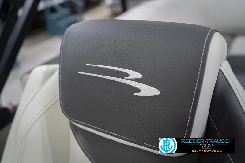 Slide: The Image of 2026 Bennington 20 SSR boat seat with logo, featuring Reeder Trausch Marine contact details. - 40