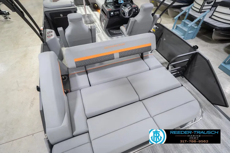 Slide: The Image of 2026 Bennington 24 MSB boat interior with gray seating and modern design. - 15