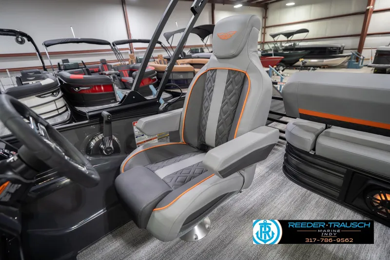 Slide: The Image of Luxurious interior of 2026 Bennington 24 MSB pontoon boat with premium seating. - 30