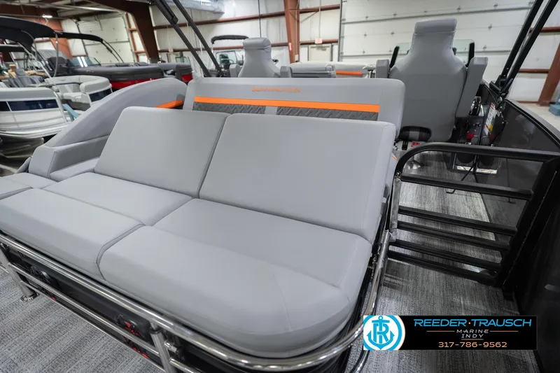 Slide: The Image of 2026 Bennington 24 MSB pontoon boat with gray seating in showroom. - 34