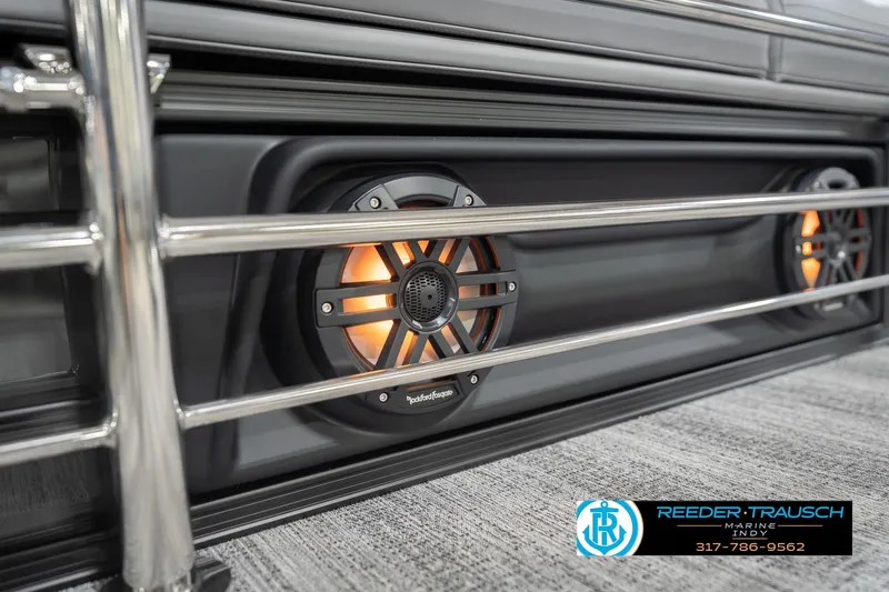 Slide: The Image of 2026 Bennington 24 MSB boat with illuminated speakers and sleek railing design. - 50