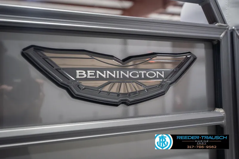 Slide: The Image of Bennington 24 MSB 2026 logo on boat exterior, Reeder-Trausch Marine branding visible. - 53