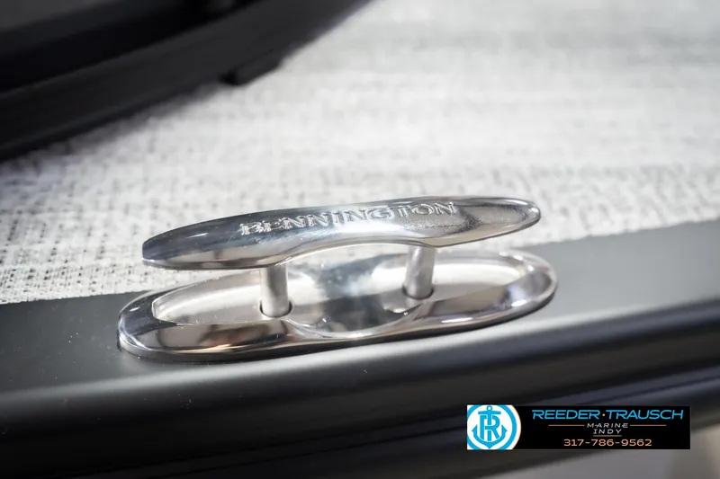 Slide: The Image of Close-up of a Bennington 24 MSB 2026 boat cleat with branding. - 59