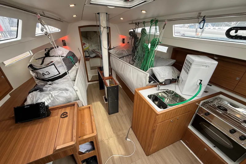 Slide: The Image of Interior of 2022 J Boats J/112E sailboat with kitchen and storage area. - 34