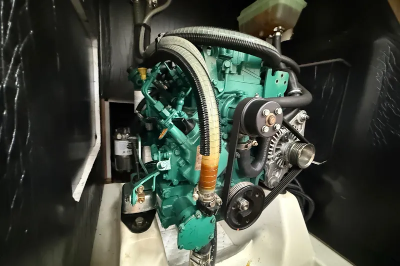 Slide: The Image of Engine compartment of 2022 J Boats J/112E sailboat, showcasing mechanical components. - 39