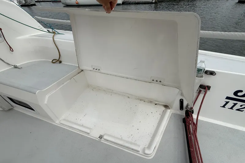 Slide: The Image of Open storage compartment on 2022 J Boats J/112E sailboat deck. - 41