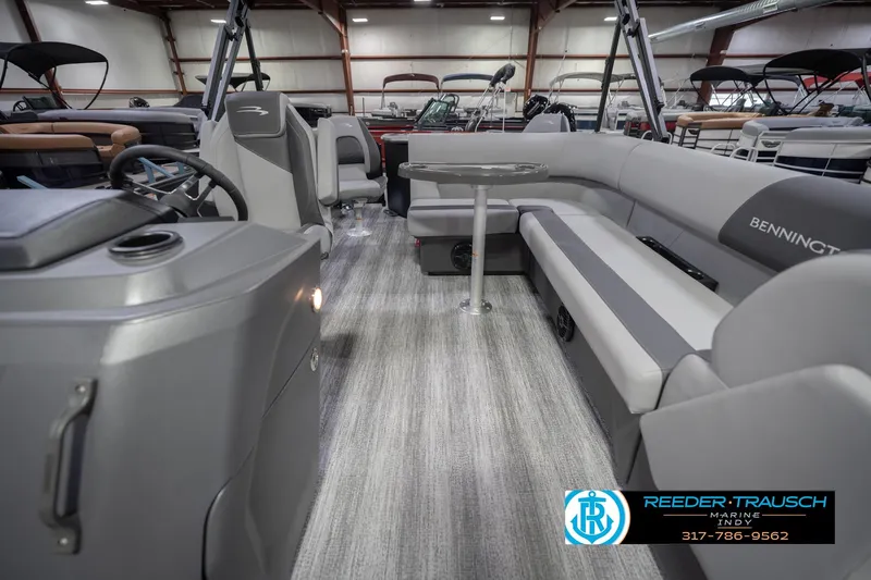 Slide: The Image of Interior of 2026 Bennington 21 SF pontoon boat with modern seating and steering console. - 17