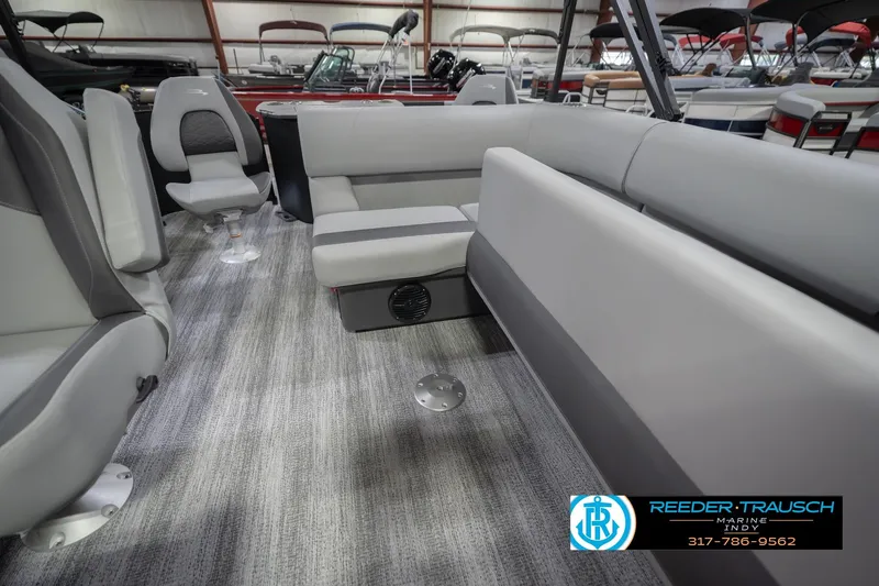 Slide: The Image of 2026 Bennington 21 SF boat interior with gray seating and carpeted flooring. - 31