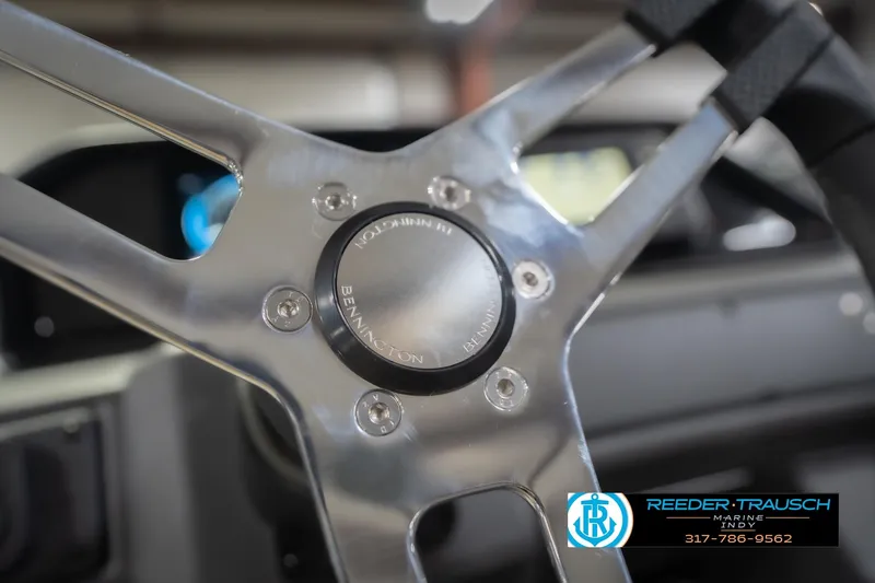 Slide: The Image of Steering wheel of 2026 Bennington 21 SF boat, featuring sleek metallic design. - 36