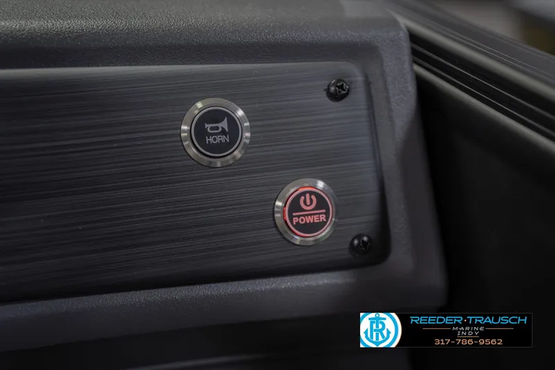 Slide: The Image of Dashboard of 2026 Bennington 21 SF with horn and power buttons. - 41