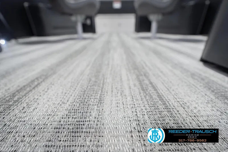 Slide: The Image of 2026 Bennington 21 SF boat interior flooring, featuring textured design and modern seating. - 51