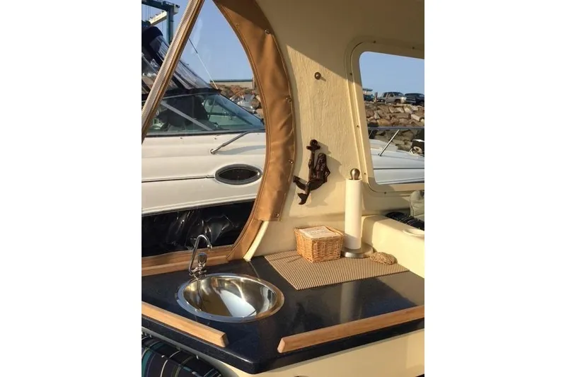 Slide: The Image of 2015 Eastern 248 Islander boat interior with sink and countertop. - 7