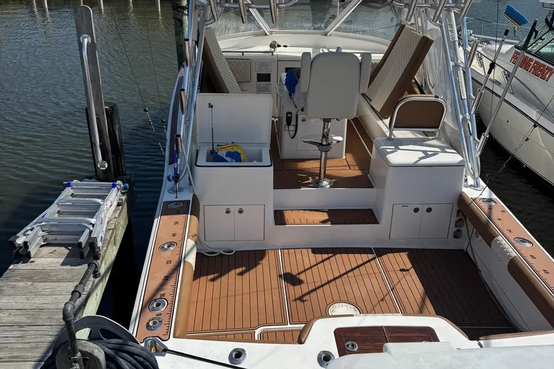 Slide: The Image of 2005 Egg Harbor 35' Express boat docked at marina, aerial view. - 1