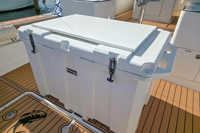 Slide: The Image of White Grizzly cooler on 2005 Egg Harbor 35' Express boat deck. - 13