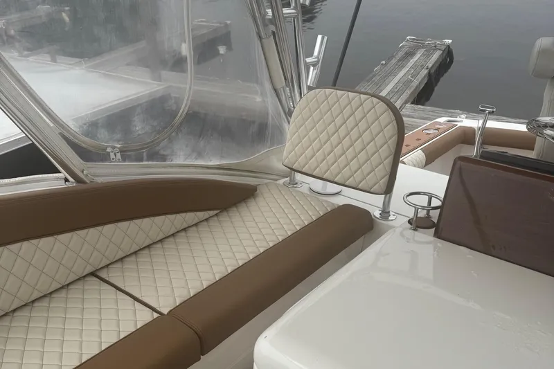 Slide: The Image of 2005 Egg Harbor 35' Express boat docked, aerial view, with wooden deck and fishing equipment. - 5