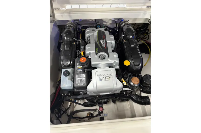 Slide: The Image of Engine compartment of 2026 Chaparral 30 SSX boat, featuring a powerful V8 engine. - 10