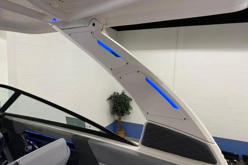 Slide: The Image of 2026 Chaparral 30 SSX boat interior with modern design and blue LED lighting. - 11