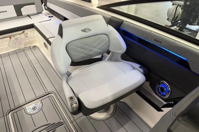 Slide: The Image of 2026 Chaparral 30 SSX boat interior with modern seating and sleek design. - 15
